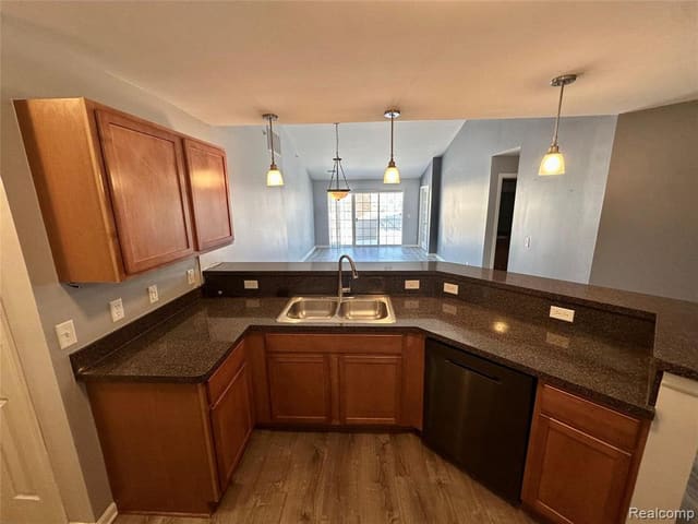 Wood-cabinet kitchen with generous counter space